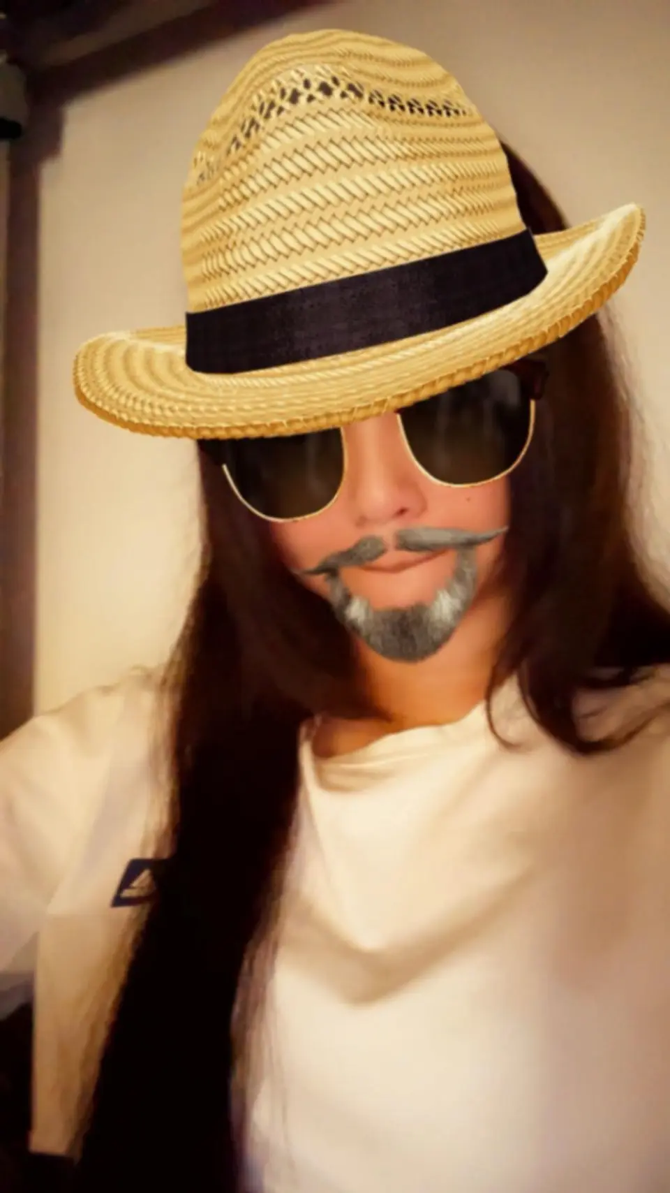 Christian wearing a hat and sunglasses